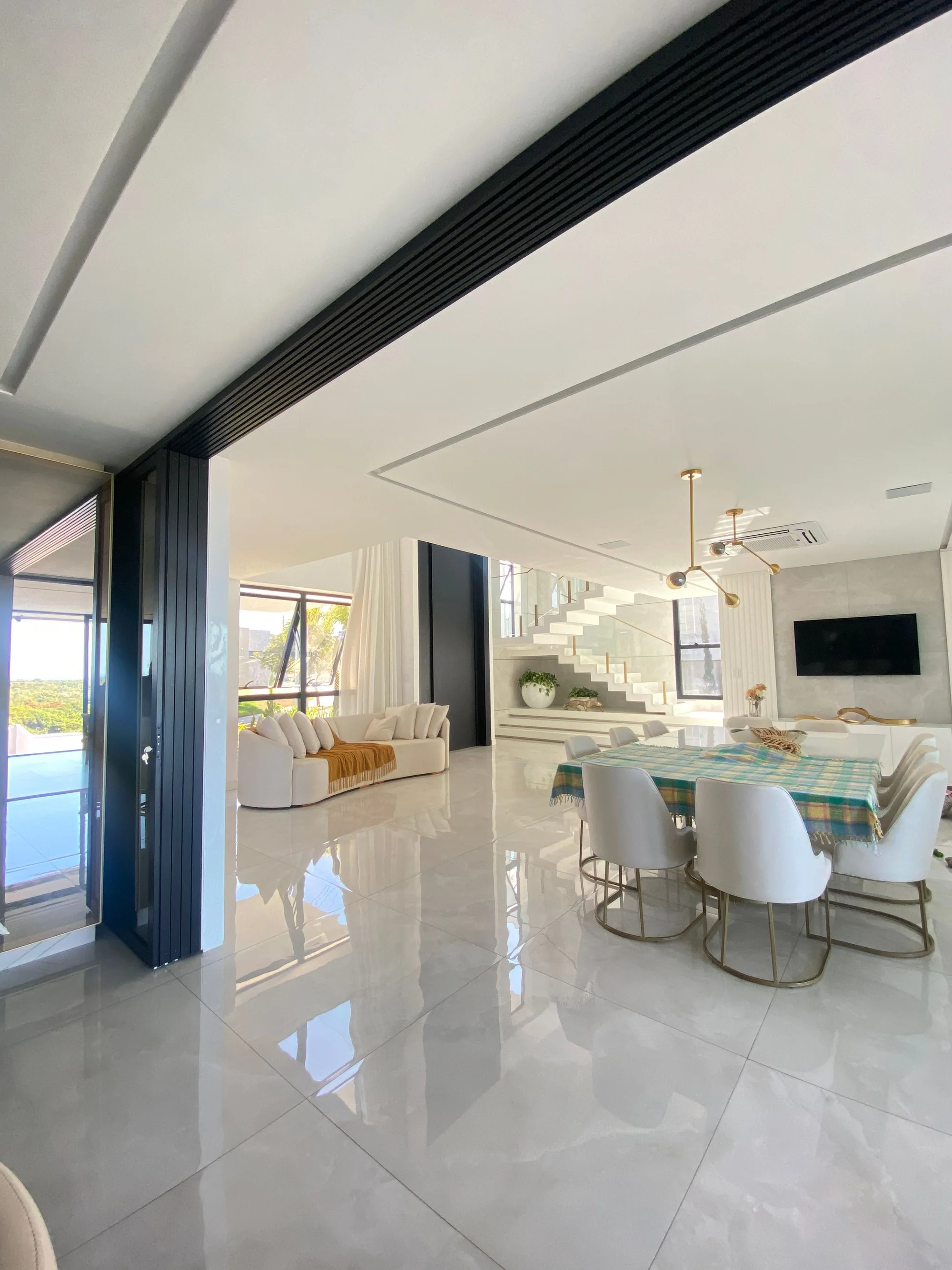 Representative modern villa living and dining interior